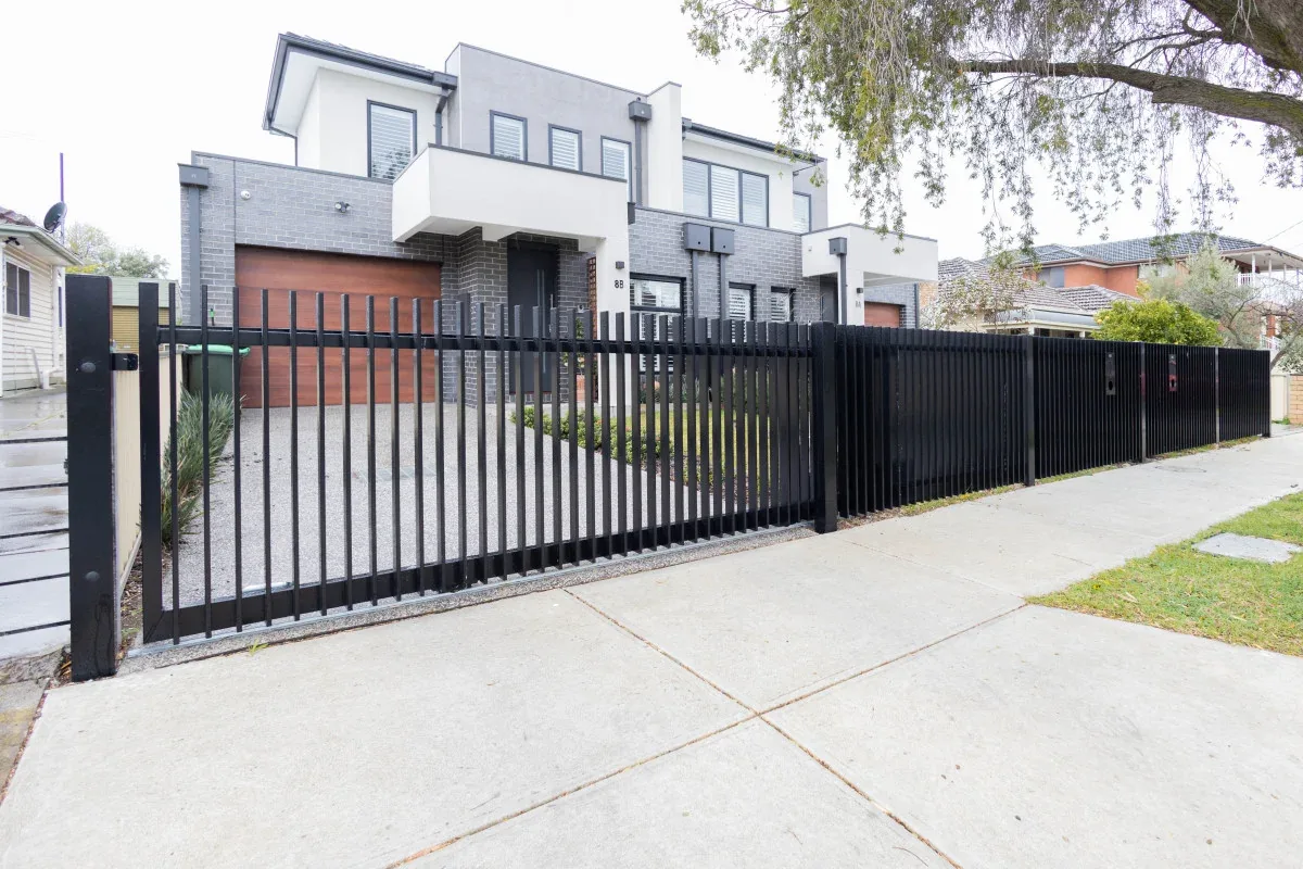 Black blade aluminium sliding gate installed in Melbourne