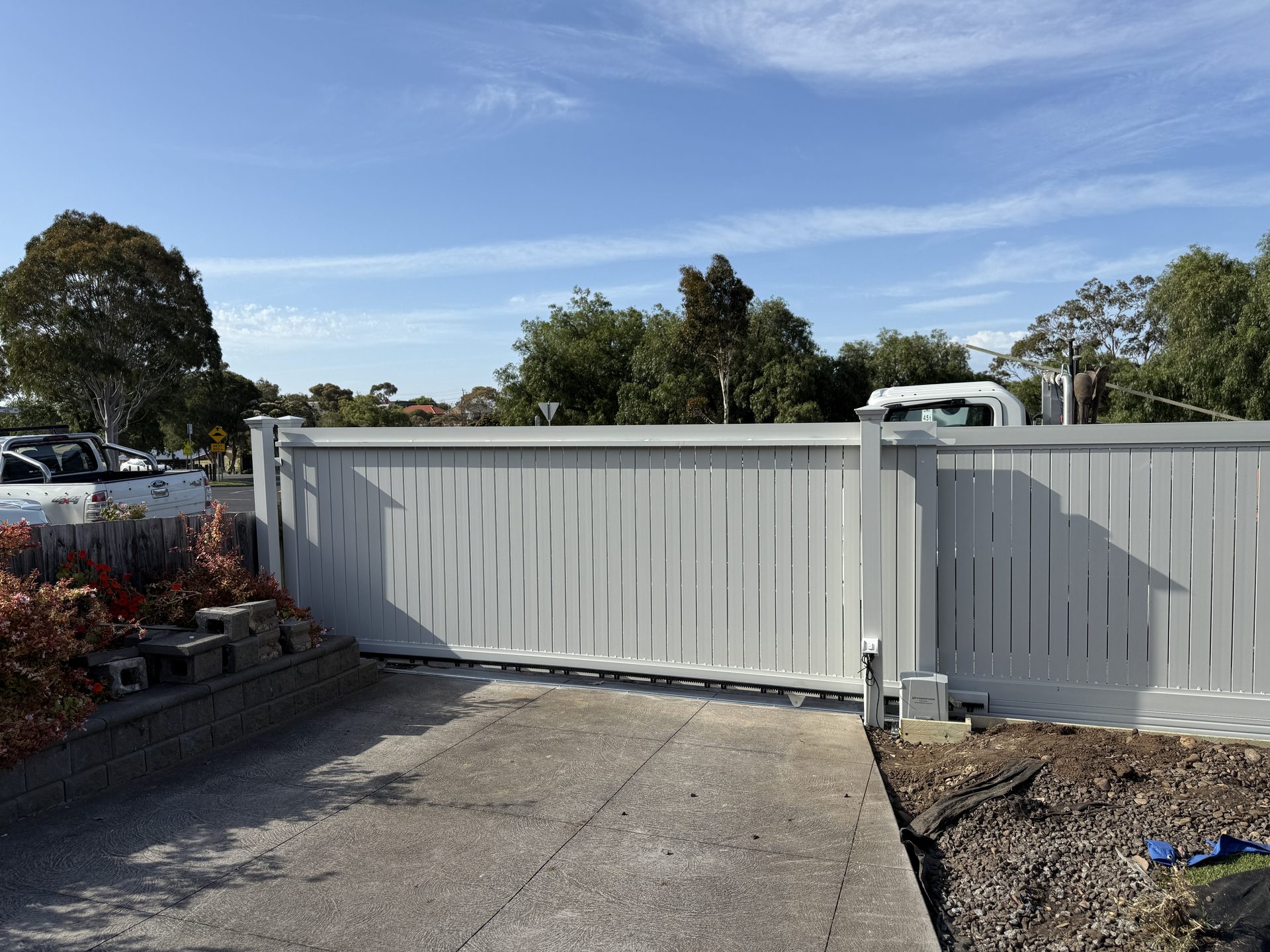 Beige automatic sliding gate installed in Melbourne