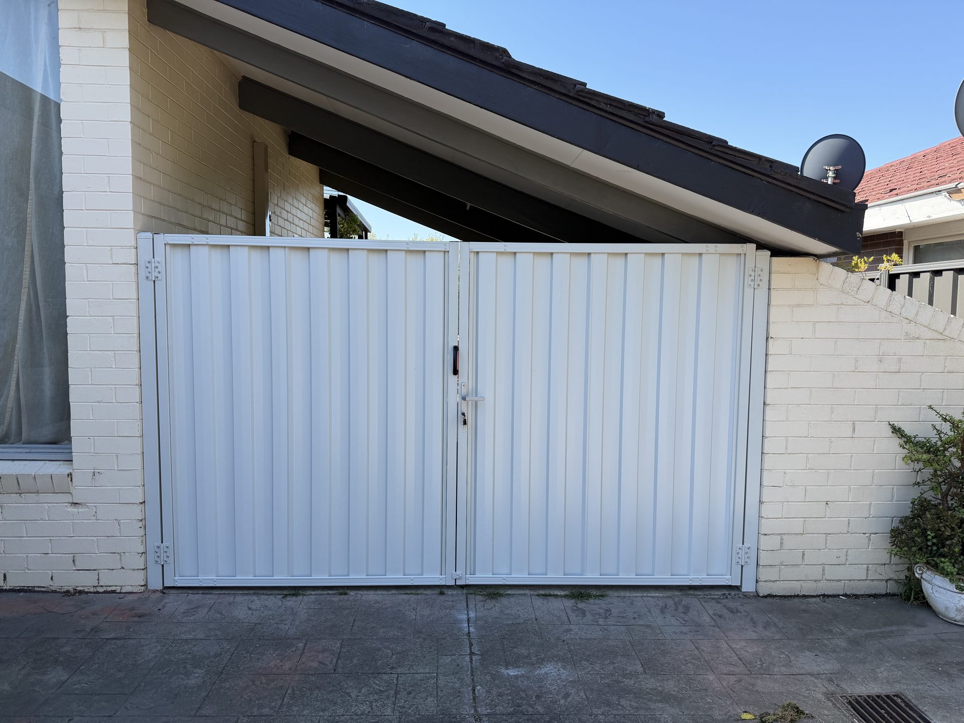 White Colorbond double driveway gate, Melbourne