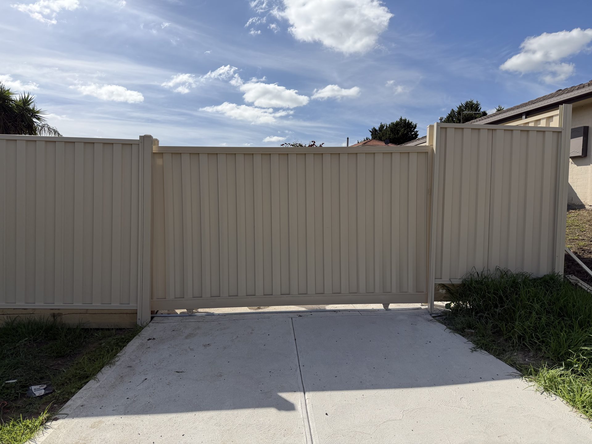 Beige Colorbond sliding gate — Melbourne