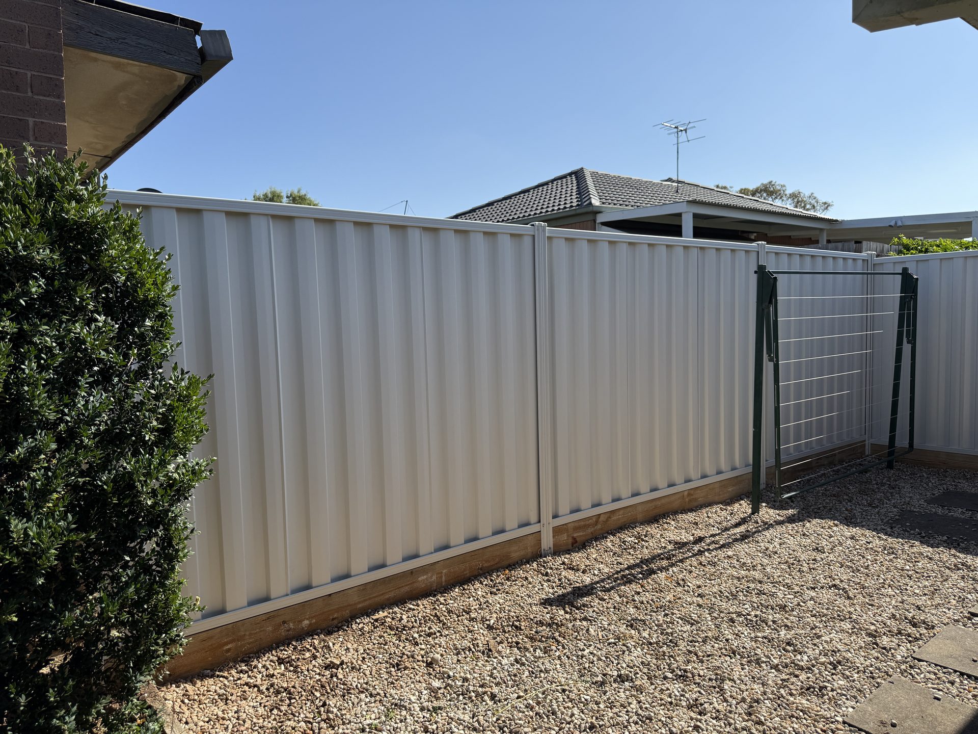 Cream Colorbond fence — Melbourne